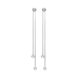 Pair of silver earrings with chain and pearl-like beads on a white background