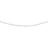 close up on details of silver minimalist chain