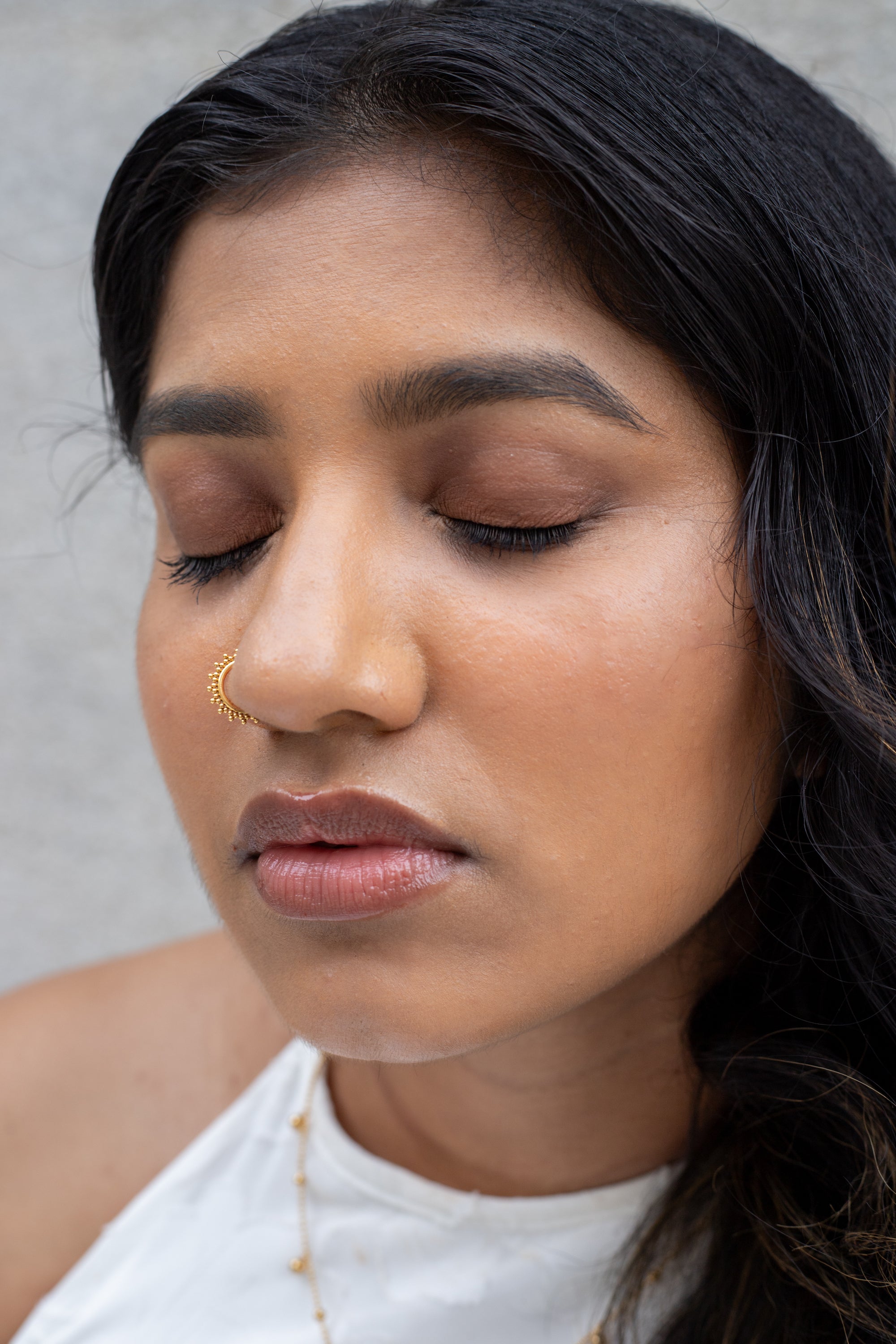 Selective Focus Photo of a Beautiful Woman with a Nose Ring · Free Stock  Photo