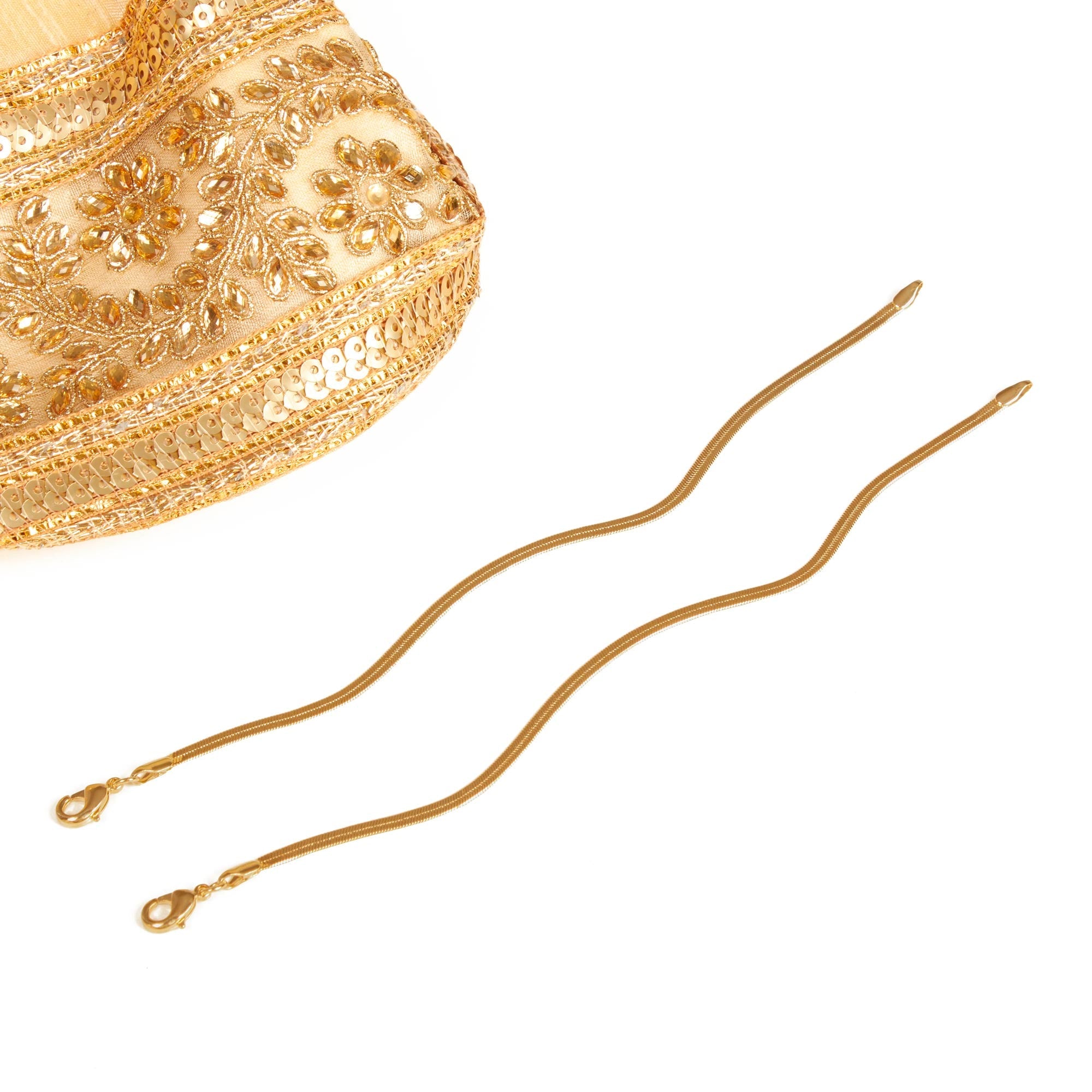 full length chain anklets styled with a gold purse
